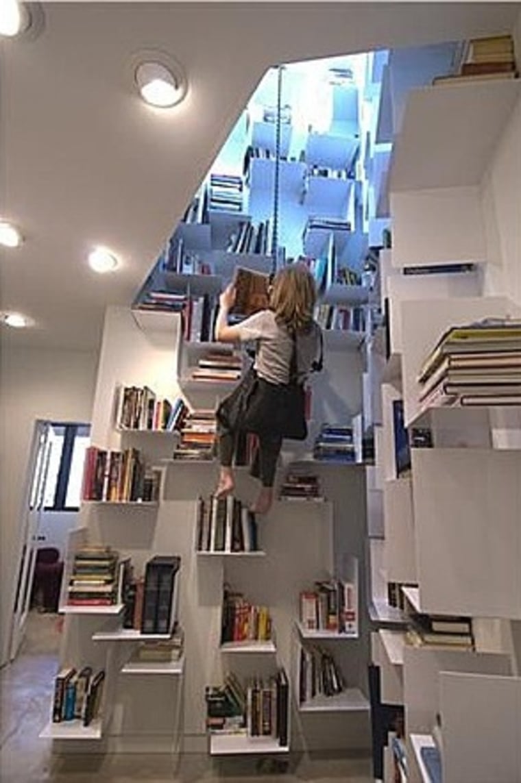 The home features a two-story bookcase.