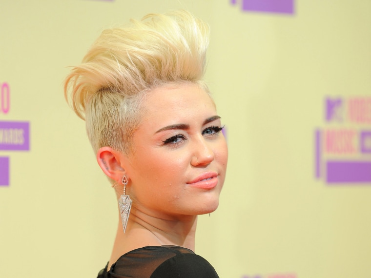 This file photo shows singer-actress Miley Cyrus attending the MTV Video Music Awards in Los Angeles.