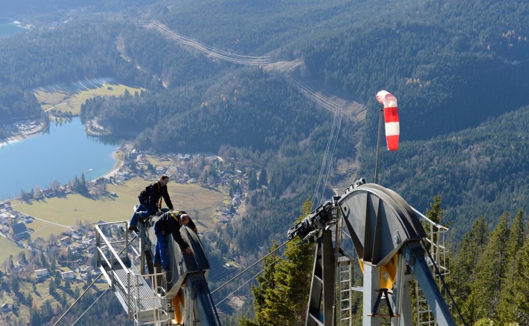 Herzogstand cable car mechanics inspect parts of the lift during the annual safety revision in front of the small village Walchensee, southern Germany on Nov. 21.