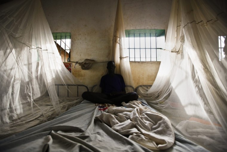 An inmate sits in his cell in Rumbek Central Prison in Rumbek, South Sudan, Oct. 25, 2012.