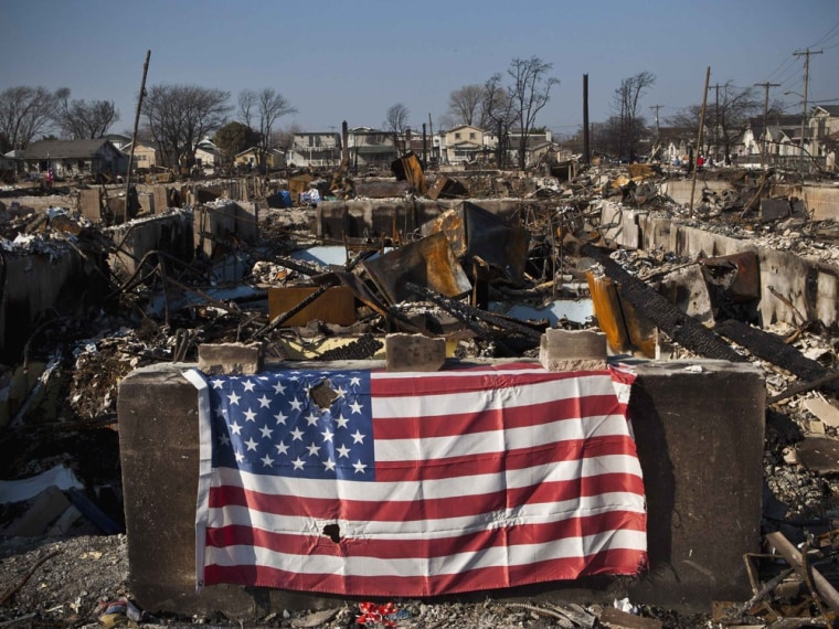 A U.S. flag is seen hanging in the Breezy Point neighborhood of Queens, New York Nov. 11 in the aftermath of superstorm Sandy.