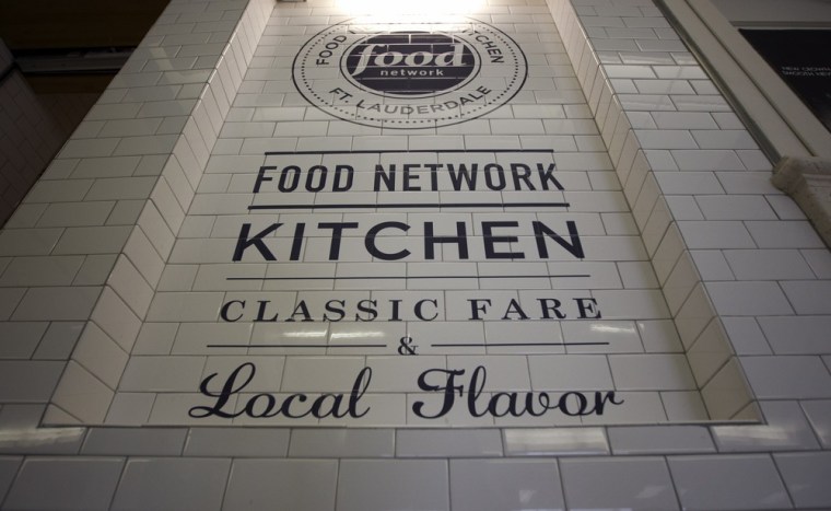 The logo for the Food Network Kitchen is seen at the Fort Lauderdale-Hollywood International Airport in Fort Lauderdale, Fla. The airport is the first...