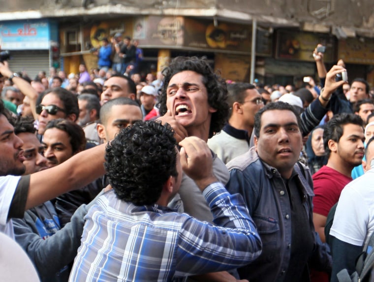 Egyptian protesters react during the funeral of Gaber Salah.