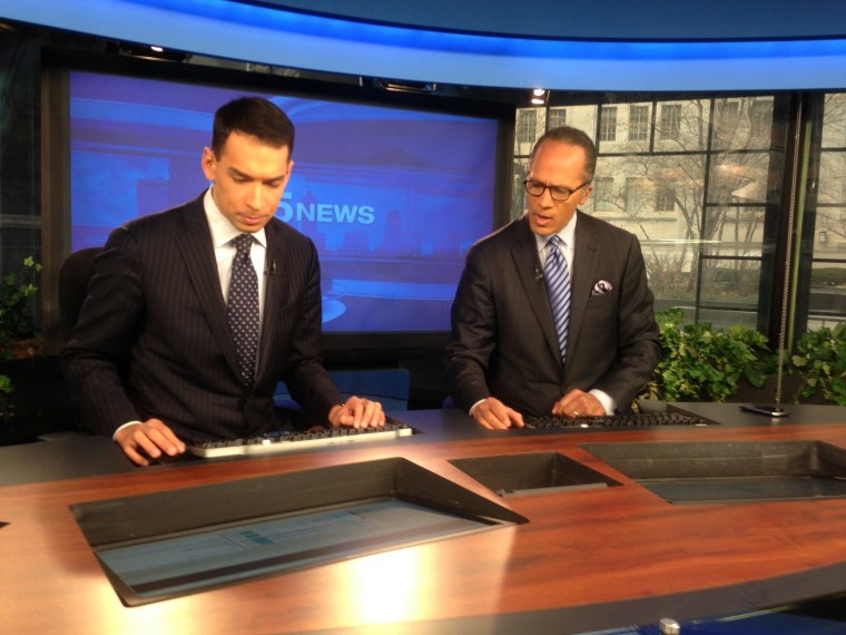 The anchormen get ready with only 2 minutes to air.