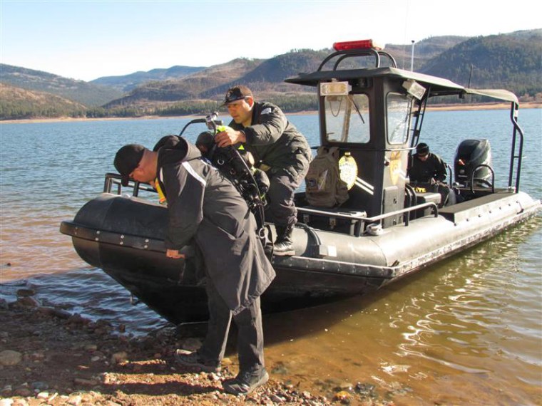 Members of the New Mexico State Police Search & Recovery Team scour Colorado's Vallecito Lake on Monday for any clues in the disappearance of Dylan Redwine.