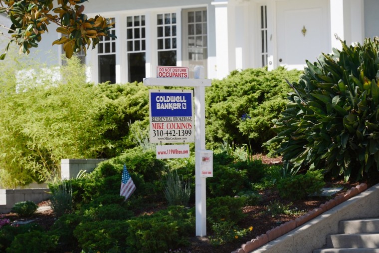 A sign advertising a home for sale is seen August 28, 2012 in Los Angeles, California. Single-family home prices rose again in September, a widely wa...
