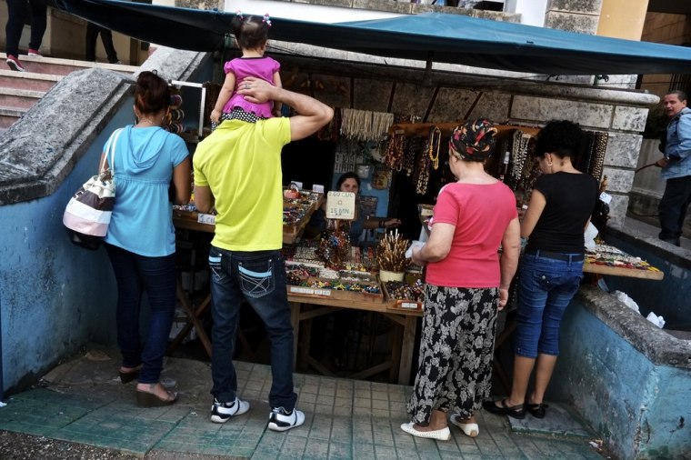 A street market sells necklaces and bracelets in Old Havana on November 12, 2012 in Havana, Cuba. Shops like this, until a year ago, were only found in the black market.