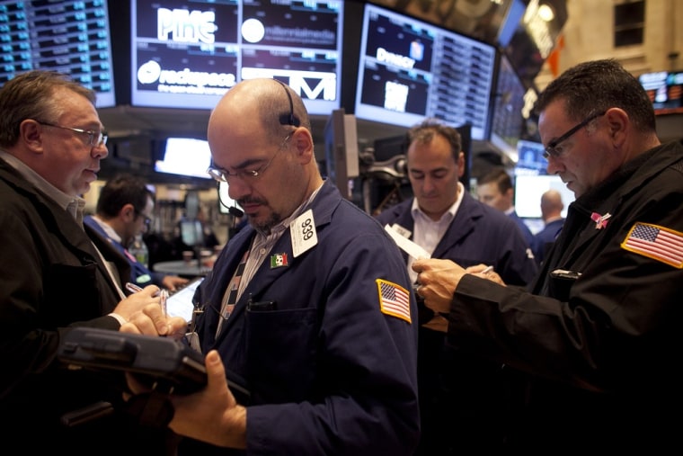 Traders work on the floor of the New York Stock Exchange on Nov. 7.