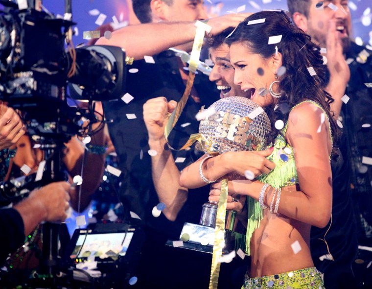 Melissa Rycroft and pro partner Tony Dovolani hold the mirror ball trophy as they are crowned champions on the season finale of ABC's \"Dancing with the Stars: All-Stars\" in Los Angeles on Tuesday.