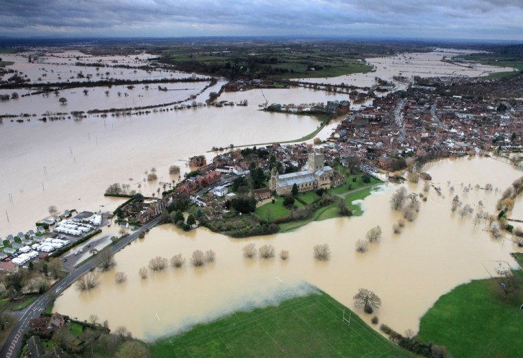 Flood waters of the river Avon and the river Severn surround the town of Tewkesbury, England on Nov. 27. Floodwaters threaten hundreds of homes in Wales and England, as river levels continue to rise, exacerbated by further water running into already saturated areas.