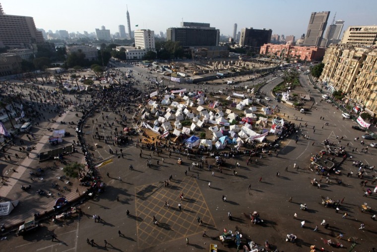 A general view shows Egyptian protesters and make-shift tenets at Tahrir Square, in Cairo Nov. 28. Media reports state that new clashes erupted in Cairo between security forces and protesters angry at a decree by President Mohamed Morsi granting himself sweeping new powers. Police fired tears gas against the stone-throwing protesters in Tahrir Square, where thousands have been camping out for several days in a bid to convince Morsi to rescind the decree.