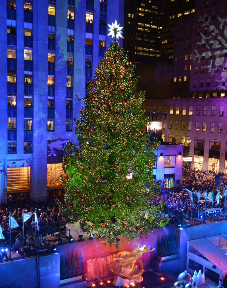 The Rockefeller Center Christmas tree is lighted at the end of an NBC television special in New York City on Wednesday night.