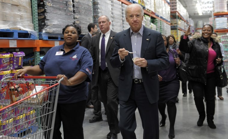 Vice President Joe Biden samples food while shopping at a Costco in Washington DC on Nov. 29.