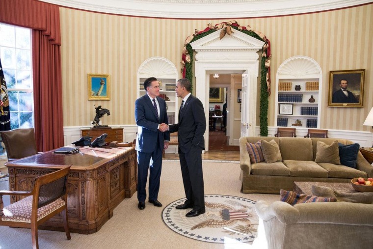 Mitt Romney, left, and President Barack Obama, right, shake hands during a meeting in the Oval Office of the White House. It was their first meeting since Obama won reelection Nov. 6 by defeating Romney.