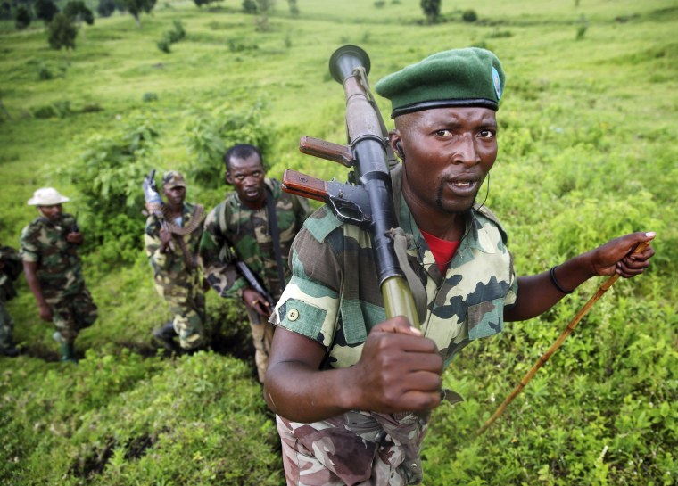 M23 rebel fighters withdraw near the town of Sake, some 42 km (26 miles) west of Goma, Nov. 30.