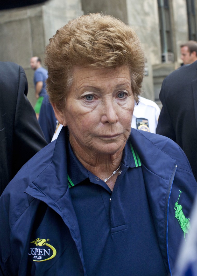 Former tennis official Lois Ann Goodman is led away from the Manhattan Criminal Court on Aug. 23.