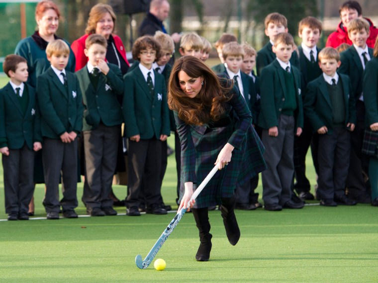 Duchess Kate helped unveil a plaque to officially open a new artificial turf playing field and met members of the school's hockey team, which she played for during her time as a pupil at the school.