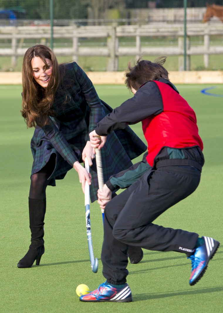 Duchess Kate is no waif! Here she shows off her field hockey skills.