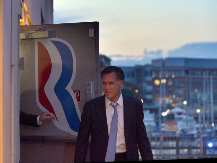 Republican presidential candidate Mitt Romney leaves his campaign headquarters in Boston on September 30, 2012.