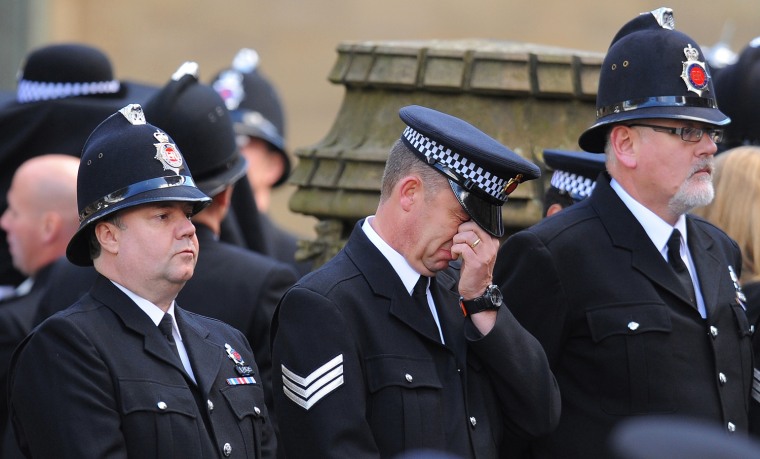British police personnel attend the funeral of murdered police colleague Nicola Hughes at Manchester Cathedral on Oct. 3.