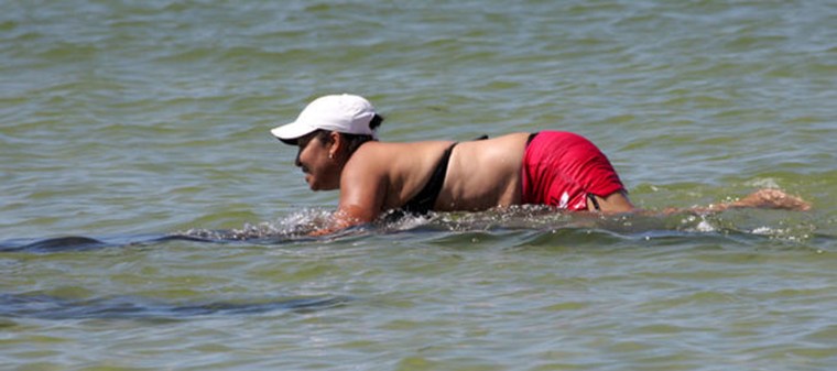 Authorities released this photo of a woman reportedly riding a manatee.