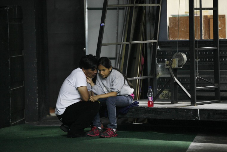 Singer Jennyfer Avila, experiencing a bout of stage fright, is comforted by her father prior to her performance in