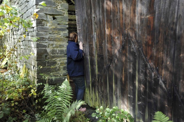 Volunteer Kirsty Kelly helps to search for missing schoolgirl April Jones, near Aberangell, Mid Wales on Oct. 4.