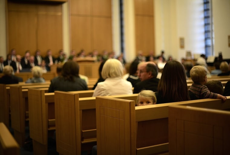 Mormons attend a service at a church beside the Preston England Temple in Chorley, Europe's biggest Mormon temple, September 26, 2012.