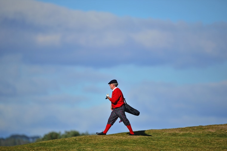 A competitor taking part in the World Hickory Open golf championship during the first round on Oct. 8.