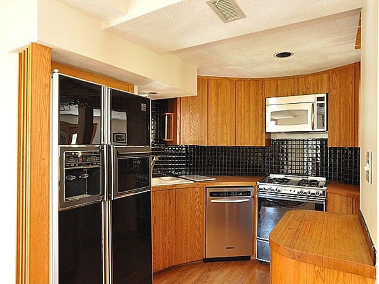 Although it looks medieval from the outside, the interior of the Massachusetts castle features all the latest conveniences, such as this ultramodern kitchen.