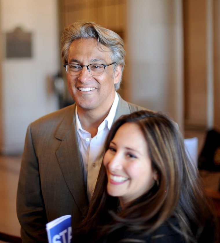 Suspended San Francisco Sheriff Ross Mirkarimi and his wife Eliana Lopez arrive at a Board of Supervisors meeting on Tuesday in San Francisco. The Board planned to vote on removing Mirkarimi, who pleaded guilty to a misdemeanor charge in a domestic violence case, from office.