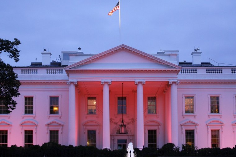 The White House in Washington, D.C., is bathed in pink light Monday, Oct. 3, 2011, in recognition of October as Breast Cancer Awareness month.