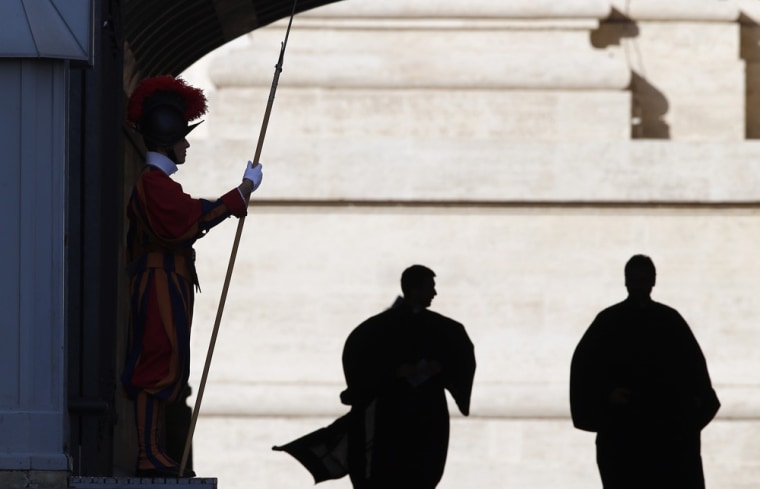 A Swiss guard stands before the arrival of Pope Benedict XVI.