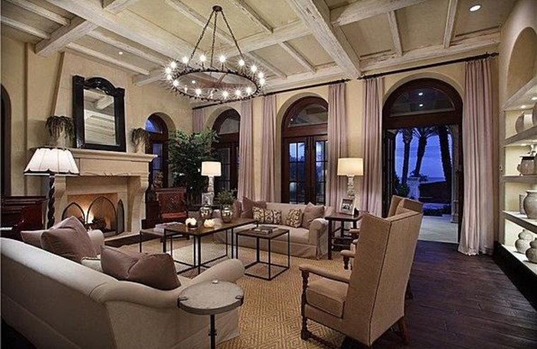 A high ceiling and luxurious furnishings are features of the living room of Kevin James' new home.
