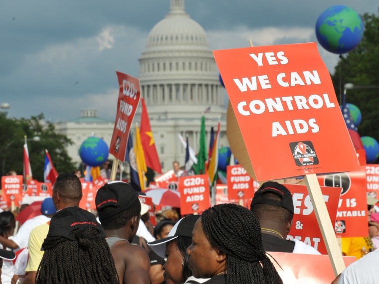 Activists take part in the Keep the Promise Alive 2012 AIDS march and rally on the streets of Washington on July 22,2012.