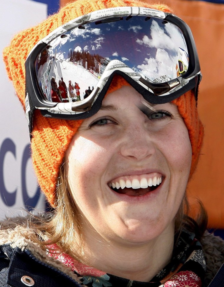 Canada's Sarah Burke celebrating on the podium after winning the women's halfpipe freestyle FIS World Cup Grand Finals in Chiesa Valmalenc, Italy in 2008.