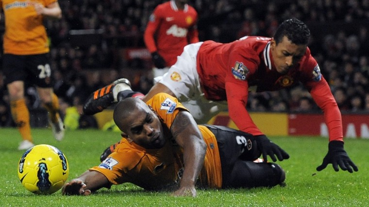 Wolverhampton Wanderers' Ronald Zubar challenges Manchester United's Nani during their English Premier League soccer match in Manchester, on Dec. 10.