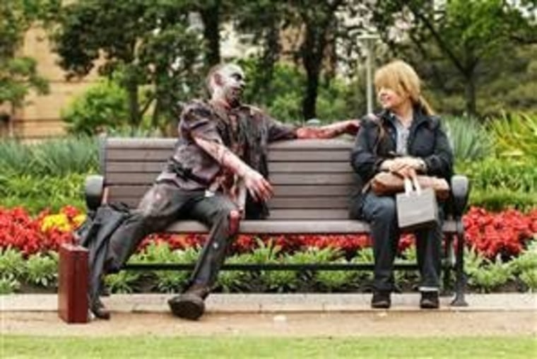 This guy, sitting on a park bench during Australia's Sydney Zombie Walk, is just dressed as a zombie. But a rare condition convinces people that they actually are walking corpses.