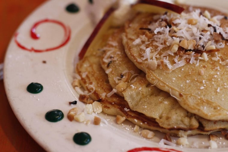 Coconut macadamia nut pancakes from Moana Bakery and Cafe in Paia, HI on Maui. Incredibly light and melts in your mouth.