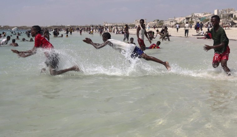 Boys play at Lido beach, near the waters of the Indian Ocean, north of Somalia's capital Mogadishu on Jan. 6, 2012. Lido beach was a famous attraction before Somalia tumbled into chaos in 1991 with the ousting of dictator Mohamed Siad Barre. In the last few years, the beach was a frontline for the Islamist al Shabaab militants, who later withdrew from most parts of Mogadishu around August 2011.