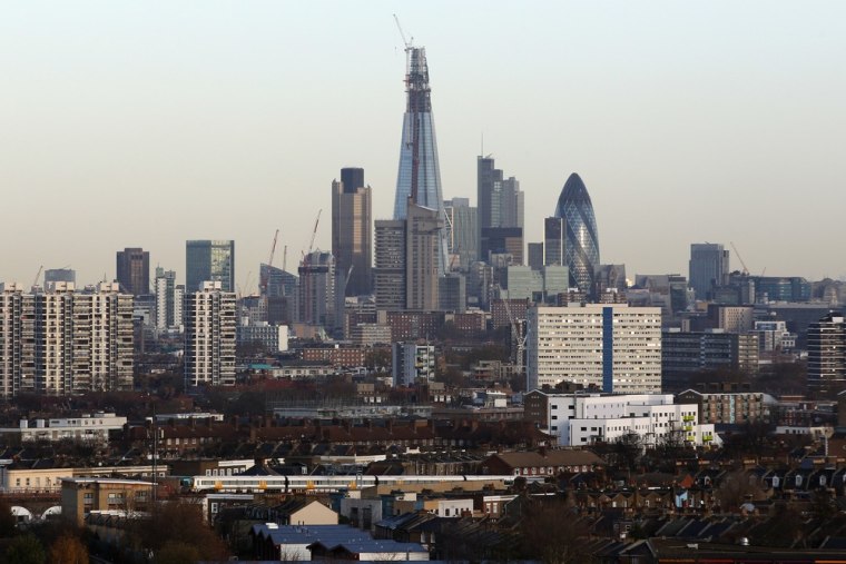 A view of the Shard on Dec. 5, 2011, towering over other high-rise buildings including Norman Foster's Gherkin, right.
