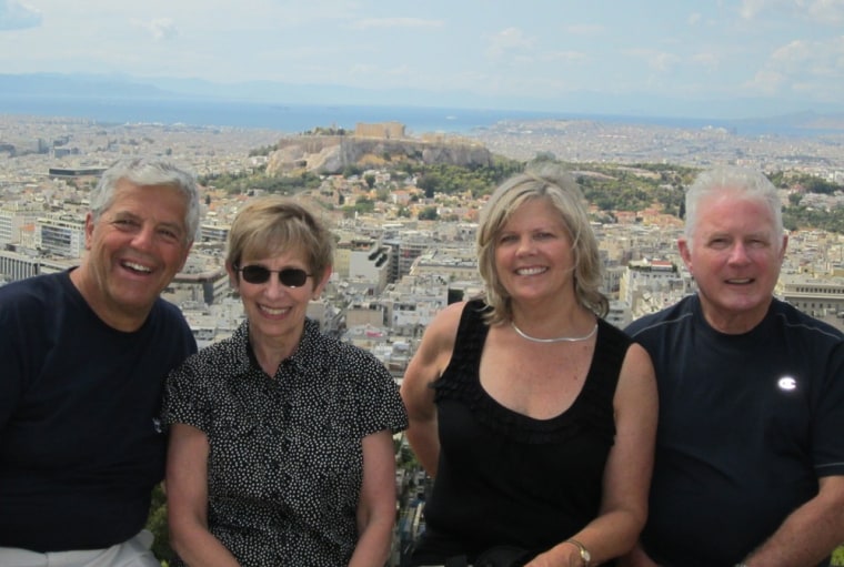 Tom Hansen, left, with his wife, Yvonne, and friends Jan and Ron Stan at a site in Athens, Greece, where he picked up the lost camera memory card.