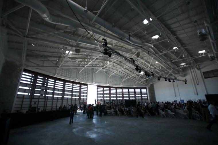 Hundreds of visitors take their seats inside the spaceship hangar at Spaceport America in New Mexico.