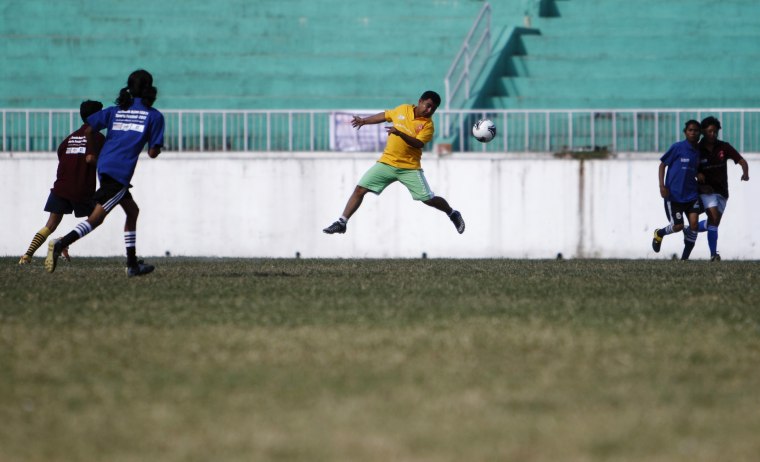 Lesbian, Gay, Bisexual, and Transgender players participate in a friendly soccer match during the opening ceremony of the first South Asia LGBT Sports Festival in Kathmandu, Oct. 12.