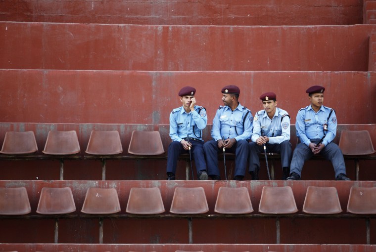 Nepalese police sit during the opening ceremony of the first South Asia LGBT Sports Festival in Kathmandu, Oct. 12.