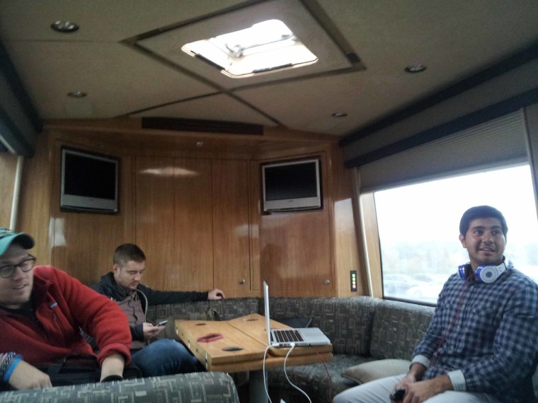 Inside the Internet 2012 Bus with Reddit co-founder Alexis Ohanian, Erik Martin and an unidentified co-campaigner.