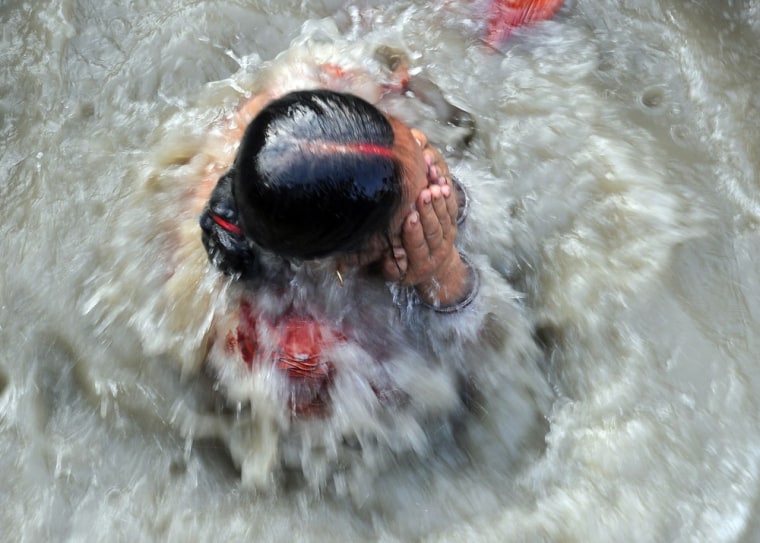 Hindu devotees perform