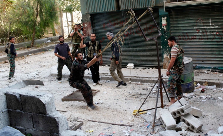 Syrian rebels use catapult to launch homemade bomb