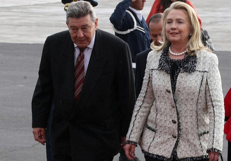 Secretary of State Hillary Clinton, walking with her Peruvian counterpart Rafael Roncagliolo, traveled to Peru to entrepreneurship among women. During the trip, she spoke to reporters about the Benghazi attacks.