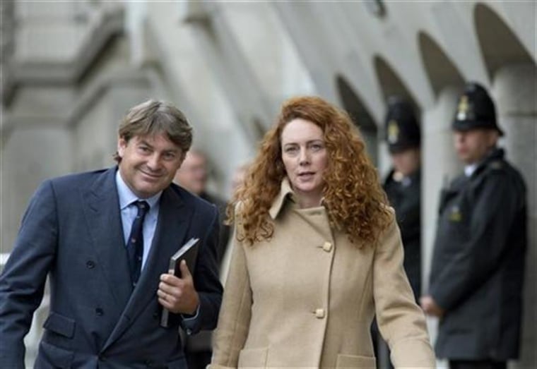 Former News International chief executive Rebekah Brooks and her husband Charlie leave the Old Bailey court in London last month.